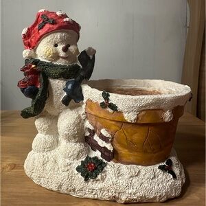 Figure of Christmas snowman candle holder decor piece